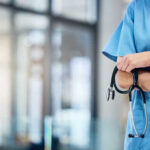 Professional Standards Finally Took Center Stage Healthcare professional holding a stethoscope in hospital