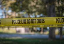 A Family Outing Ended In Unthinkable Tragedy yellow police tape cordoning off an outdoor area