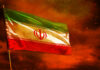 Diplomacy Or Deterrence—Time’s Running Out Iranian flag waving against a dramatic orange sky