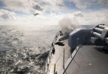 America’s Next Pacific Move Starts Here Naval ship firing a weapon into the ocean with a plane flying overhead