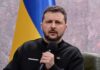 Ukraine’s Gambit: Loomer Becomes The Channel man holding a microphone during a talk