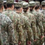Military Justice Still Faces A Credibility Test Soldiers in camouflage uniforms standing in formation from behind