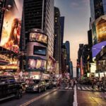A Luxury Project Hits A Dangerous Snag Busy street scene in Times Square with cars and pedestrians