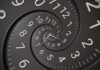 The Clock Change Could Soon Be History Spiraling clock face with repeating numbers and hands