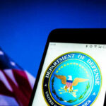 Congress Quietly Advanced a Major Defense Partnership Department of Defense logo on smartphone screen flag