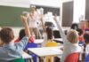 California’s Back-to-School Bill Just Got an Upgrade Elementary students raise hands in a classroom