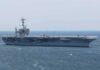 Aircraft carrier sailing at sea