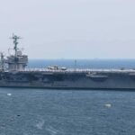 Aircraft carrier sailing at sea
