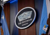Washington’s Military Makeover Goes Beyond the Brass The Pentagon emblem between two flags.