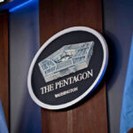 Washington’s Military Makeover Goes Beyond the Brass The Pentagon emblem between two flags.