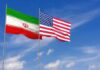 Tehran Put Seven Days Down. Washington Balked Iran and United States flags waving on flagpoles