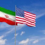 Tehran Put Seven Days Down. Washington Balked Iran and United States flags waving on flagpoles