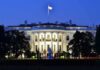 The White House illuminated at dusk