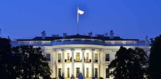 The White House illuminated at dusk