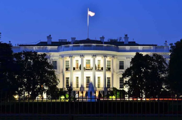 The White House illuminated at dusk
