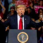 Lincoln Shrine Name-Grab? Trump Explodes Donald Trump speaking at a rally podium with arms raised