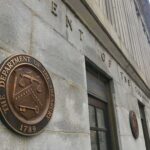 Washington Turns the Financial Screws on Tehran U.S. Treasury building exterior with bronze seal on stone wall