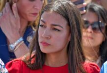 woman in red top at an outdoor event