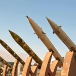 America Just Placed A Massive Bet On Missiles Row of surface-to-surface missiles mounted on display stands outdoors