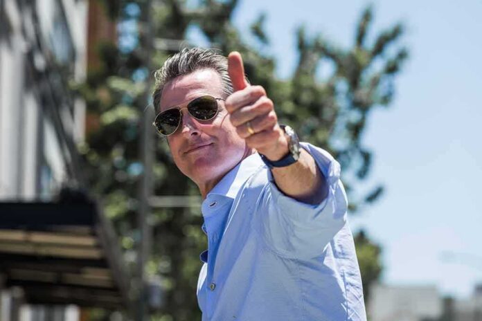 shutterstock_1677676429 man in sunglasses giving a thumbs-up outdoors