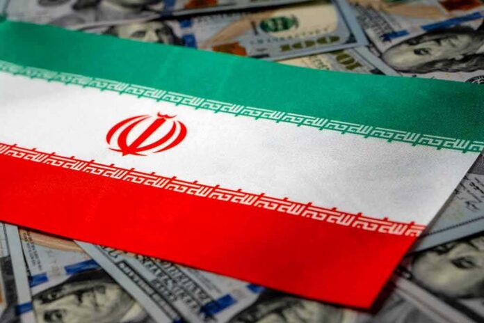 Iran flag on scattered US dollar bills