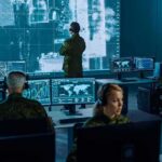 Do The Strike Dates Match The Claims? Military analysts monitor data on multiple screens in a command center