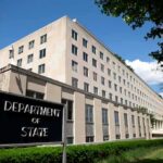 DC Infiltration Exposed — Decades In The Making Department of State building exterior on a sunny day