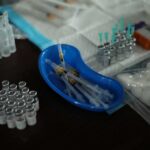 Lancaster Outbreak Sparks Statewide Alarm Medical syringes and vials arranged on a table