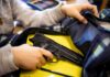 Daycare Panic: Tiny Hands, Real Gun hand reaches into backpack with a handgun inside