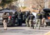 One Gunshot Leaves A Family Demanding Answers Police and sheriff officers gather around vehicles on a suburban street