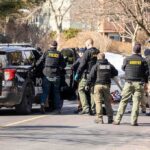 One Gunshot Leaves A Family Demanding Answers Police and sheriff officers gather around vehicles on a suburban street
