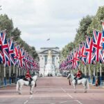 Flying Britain’s Flag Just Became A Court Battle Union Jack flags line a broad avenue with mounted guards