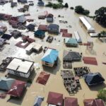 One Storm Just Brought Eastern China to Halt Aerial view of flooded residential neighborhood