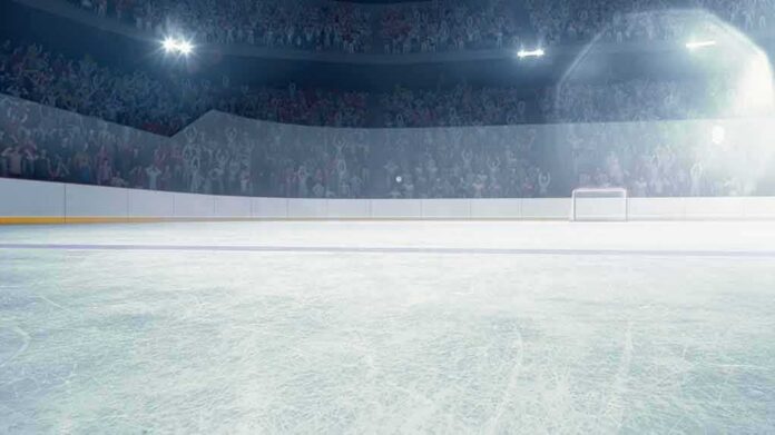 Ice hockey rink under bright arena lights