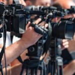 The Wedding Bill Everyone Started Talking About television cameras on tripods at a media event