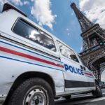 Police van near the Eiffel Tower