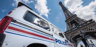 Police van near the Eiffel Tower