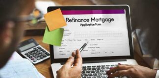 Laptop displaying refinance mortgage application form