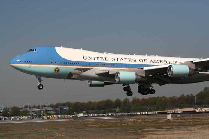 Airplane with blue and white livery landing approach