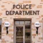 Police department building entrance with signage