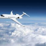 A Deadly Flight And A Preventable Question Private jet flying above clouds