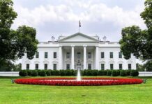 Heritage Alarm Over Mega Ballroom The White House with fountain and red flower bed