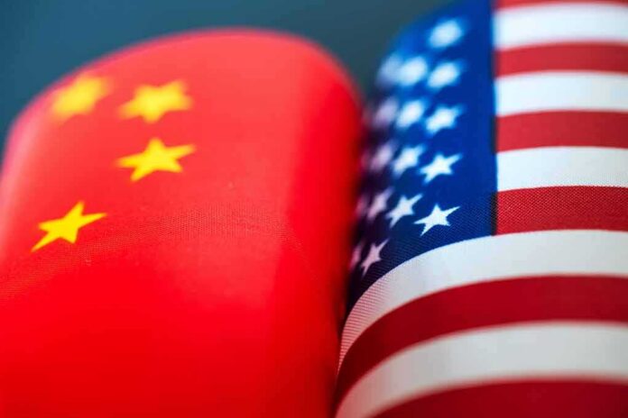 Chinese and American flags side by side