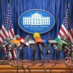 Five Days, One Briefing, and a Sudden Exit Press microphones at a White House briefing podium