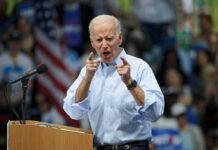 A Veteran Reporter Says His Story Was Buried Joe Biden speaking at a rally, pointing with both hands at the podium