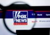 Fox News website logo under magnifying glass