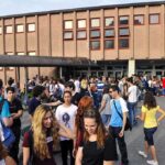 Student Uprising Shuts Paris – Chaos Spreads Students gathered outside a school building entrance