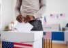 Integrity Test: Washington Ballots Seized Voter places ballot into a box at a polling station