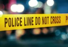 Yellow police tape with do not cross warning