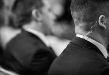 Security guard in suit with earpiece